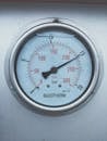 White and Gray Analog Gauge at 200