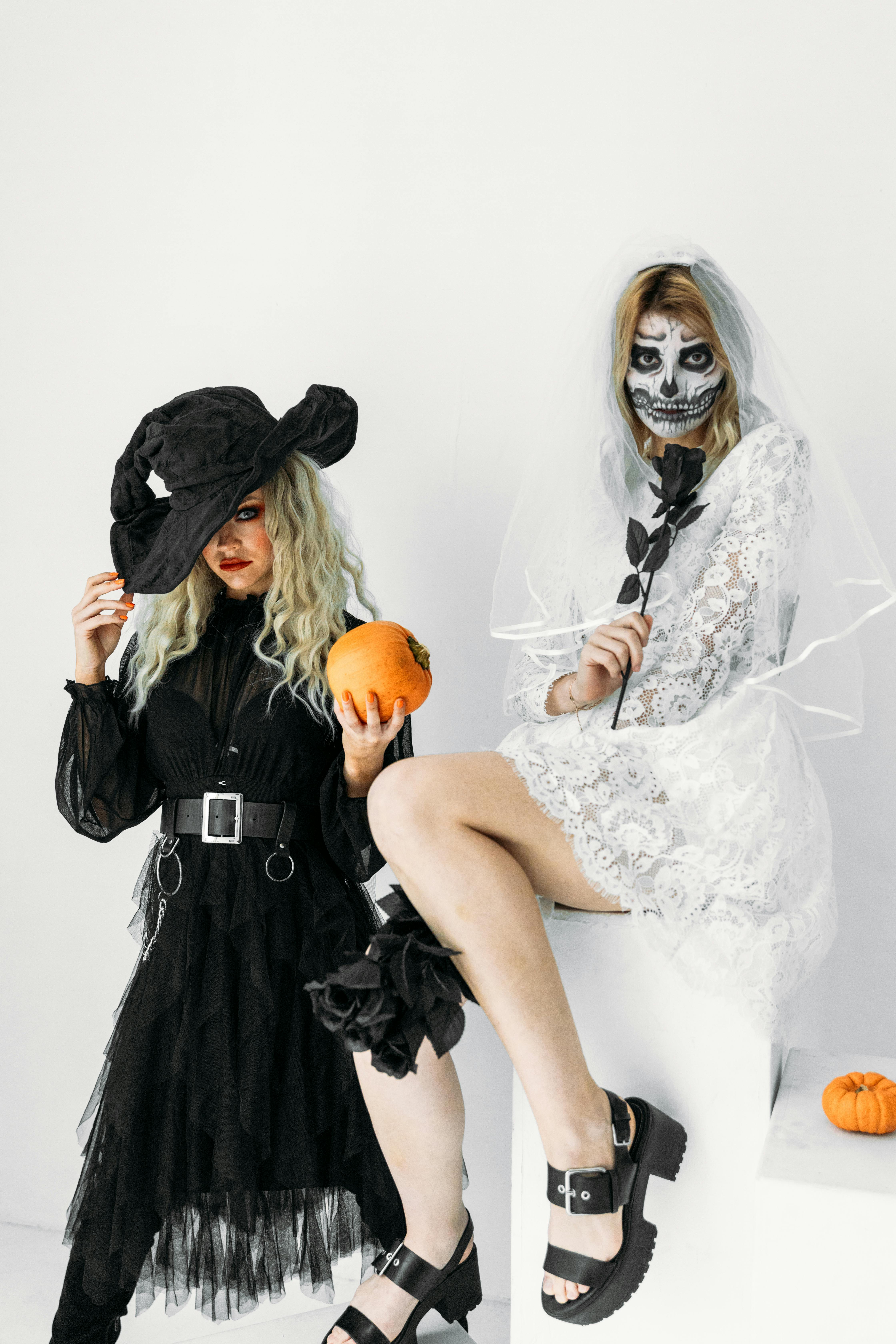 two women in black and white dress