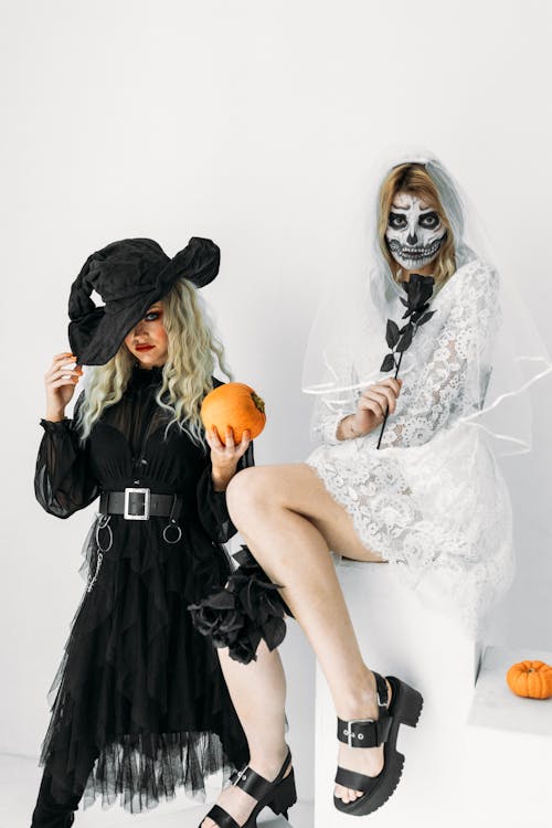 Two Women in Black and White Dress 