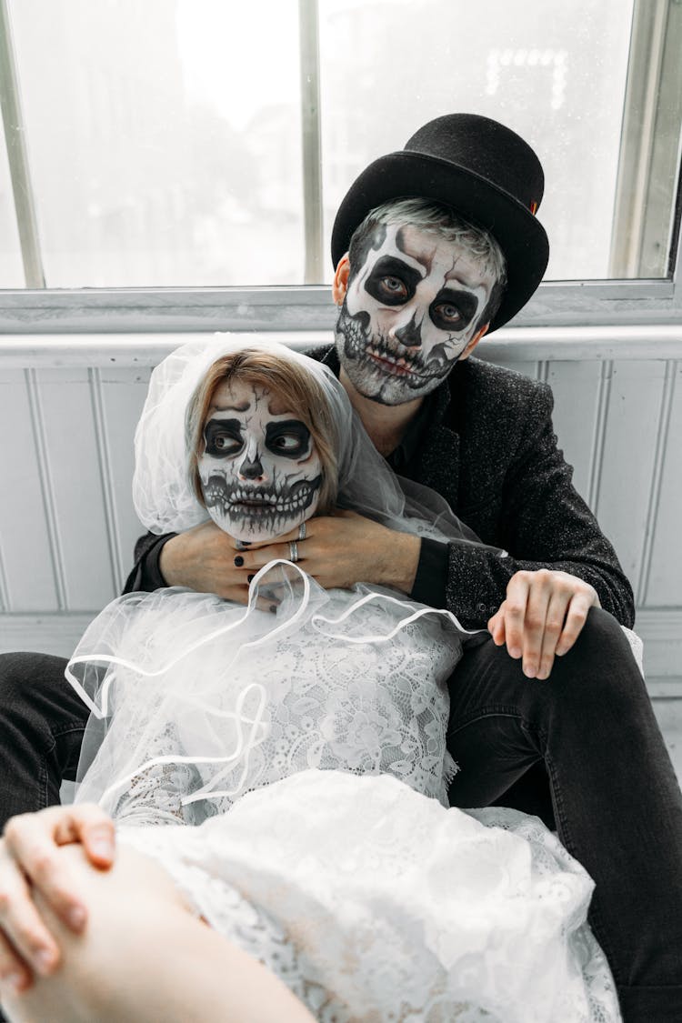 Man And Woman With Scary Face Paints