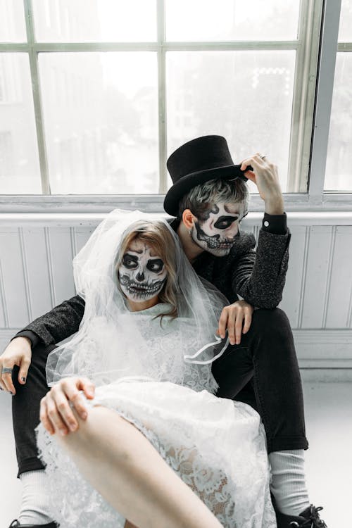 Bride And Groom With Scary Face Paints