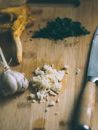 Chopped ingredients on chopping board with knife