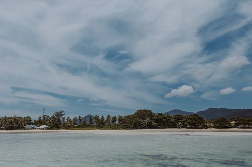 Free An Island Under the Cloudy Sky  Stock Photo