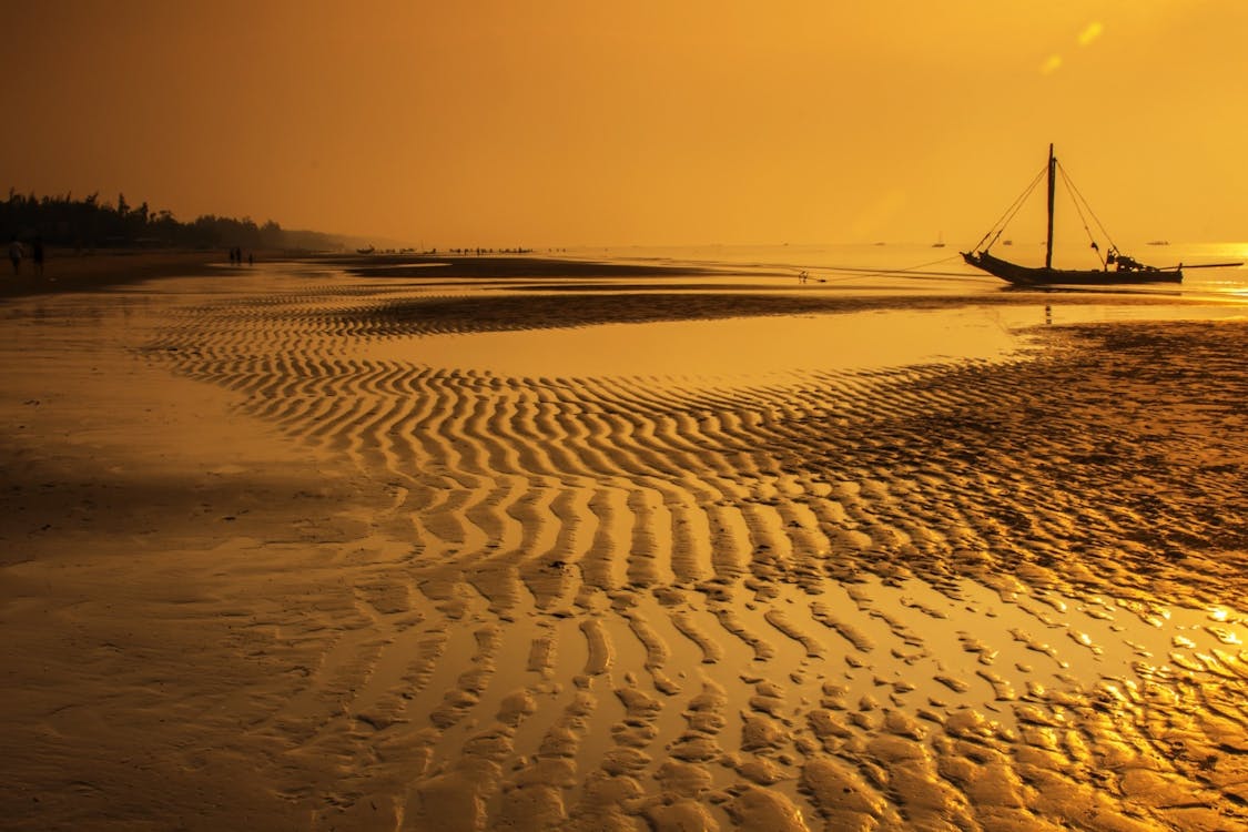 Foto profissional grátis de água, alvorecer, areia