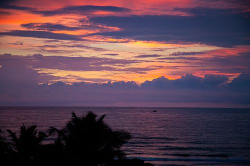 Free Serene sunset view over the Arabian Sea from Goa, India with vibrant sky colors. Stock Photo