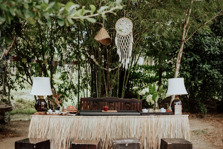 Dreamcatcher Above Table In A Jungle 