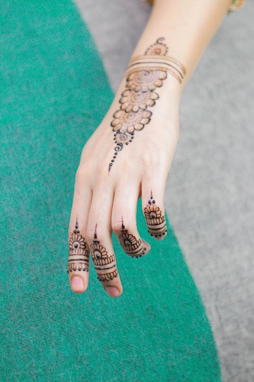 Flower Pattern Mehndi on a Woman's Hand