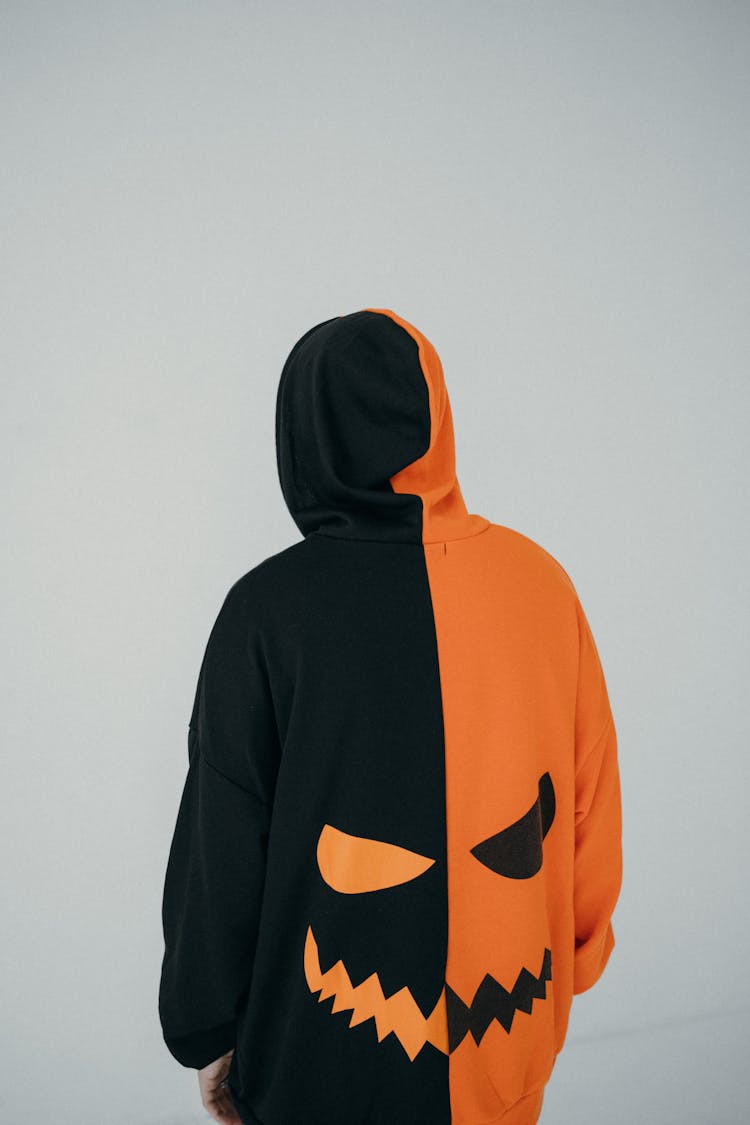 Back View Of Person Wearing Pumpkin Hoodie