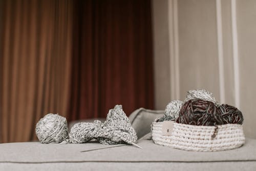 Free Yarn Rolls on Knitted Basket Stock Photo