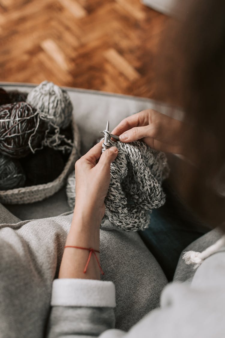 A Woman Knitting Yarn Textiles