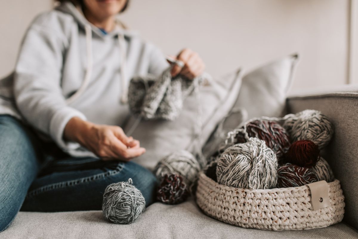 Yarn balls in a woven basket for craft supply storage