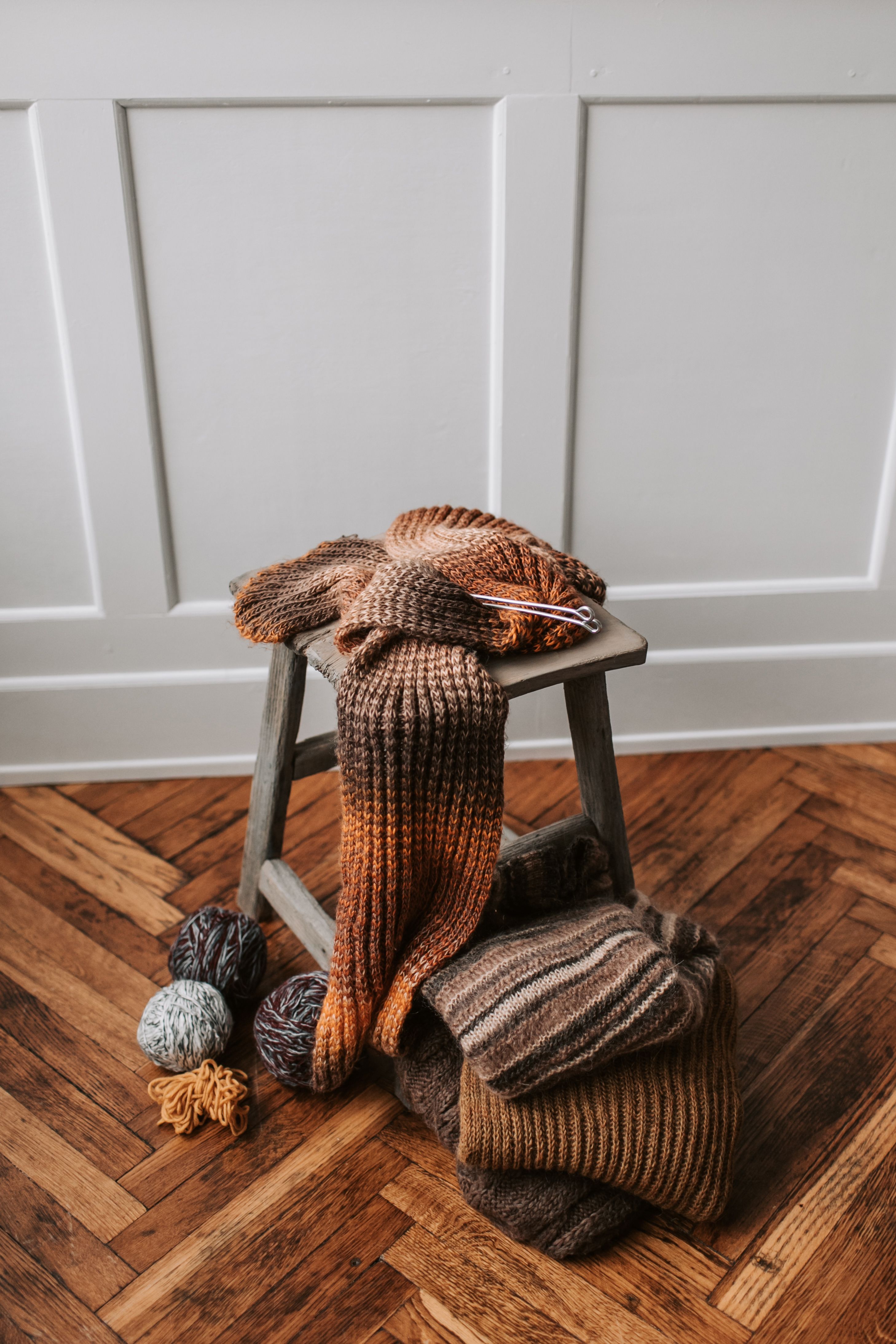 Knitted Brown Scarf on a Wooden Stool · Free Stock Photo