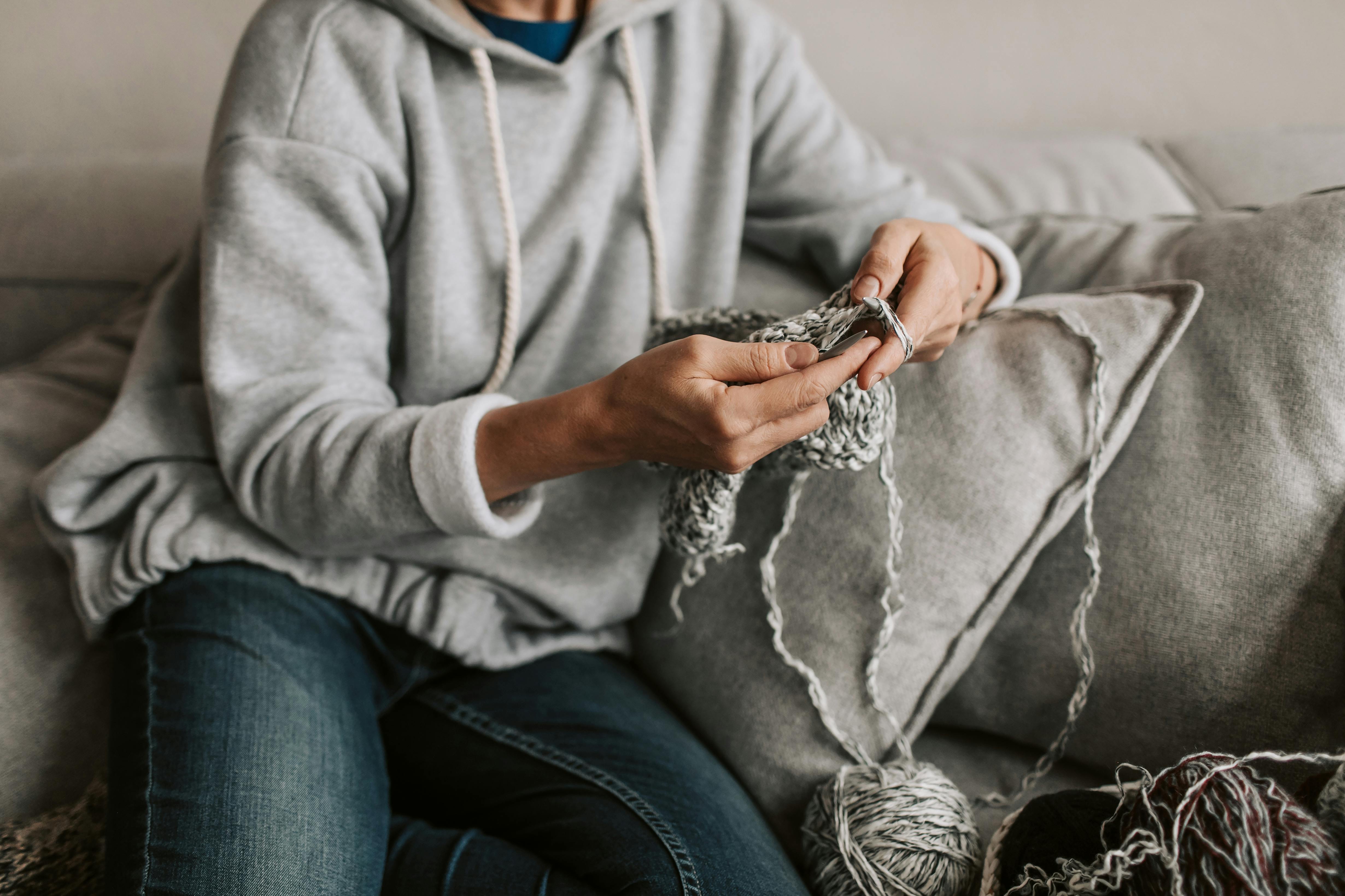 knitting while sitting on the sofa