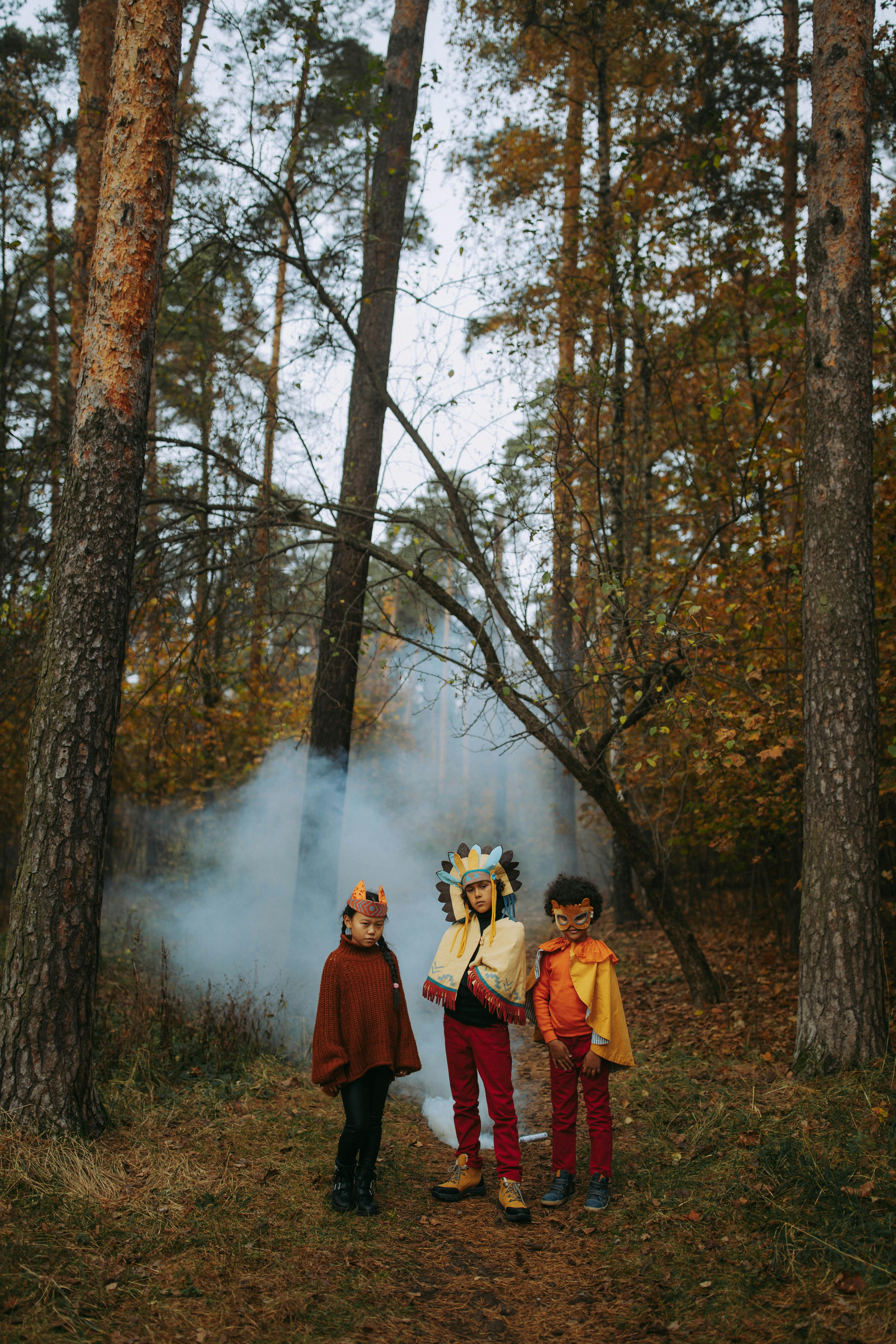 children posing wearing their costumes