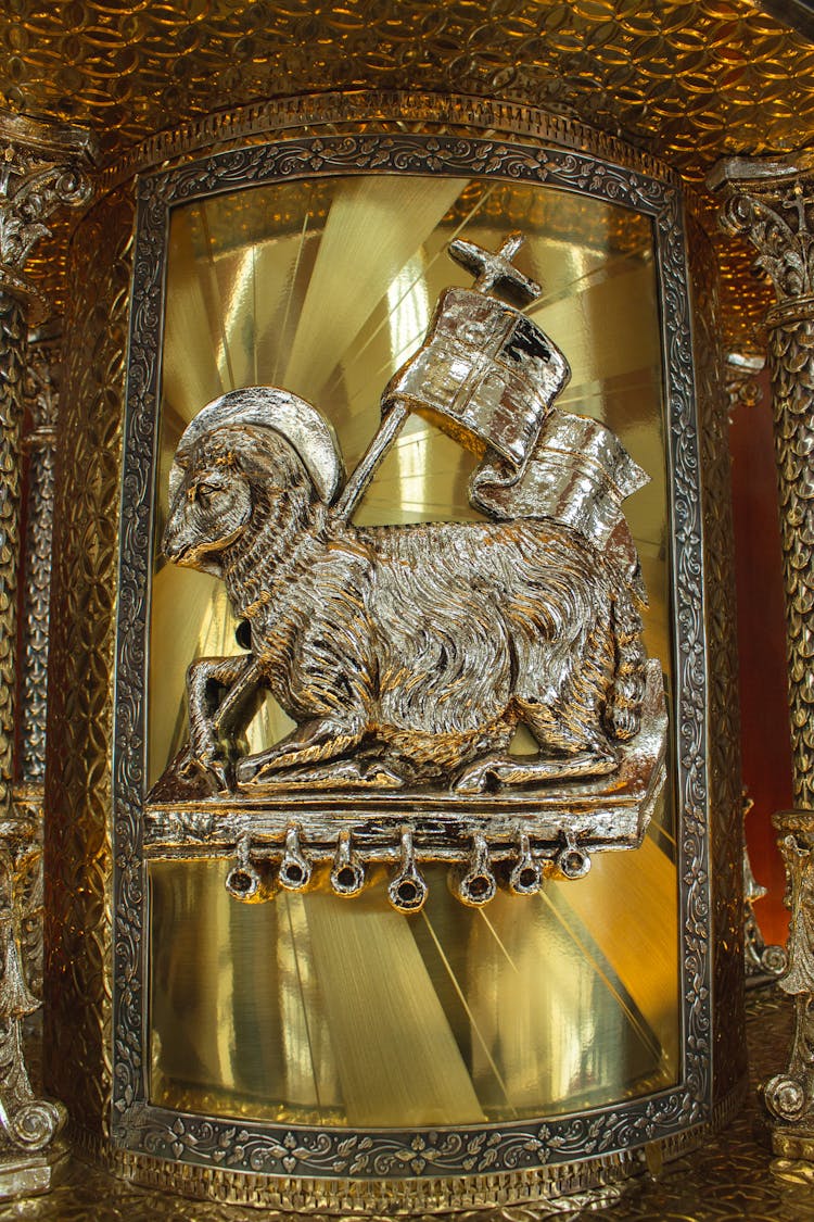 Close-up Of Golden Animal Sculpture In Frame