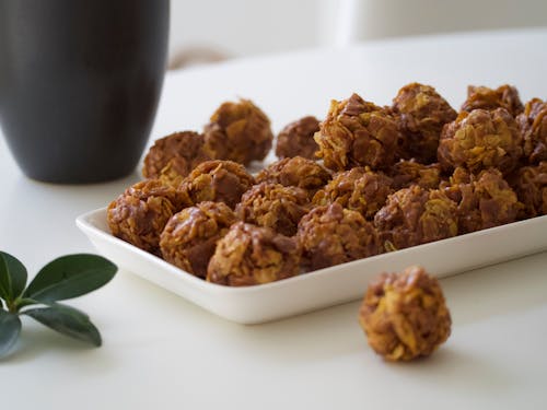 Chocolate Balls with Cornflakes Coating on the Plate