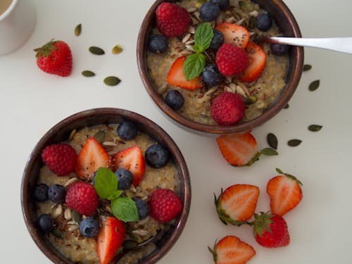 Free Oatmeal With Fresh Berry Fruits in a Bowl Stock Photo