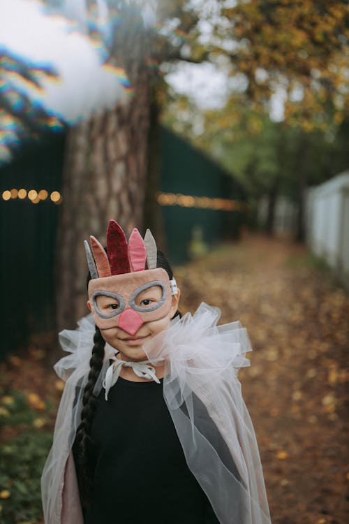 A Girl Wearing a Mask