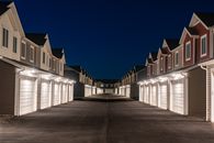White Concrete Building during Night Time