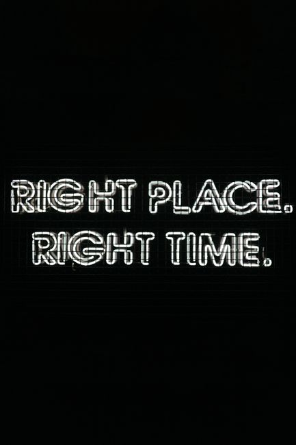 Glowing neon text on a black background saying 'Right Place. Right Time.' for motivation and inspiration.