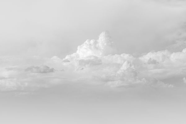 A serene and tranquil cloudscape captured from below, showcasing soft wh — Photo by Behzad NK on Pexels