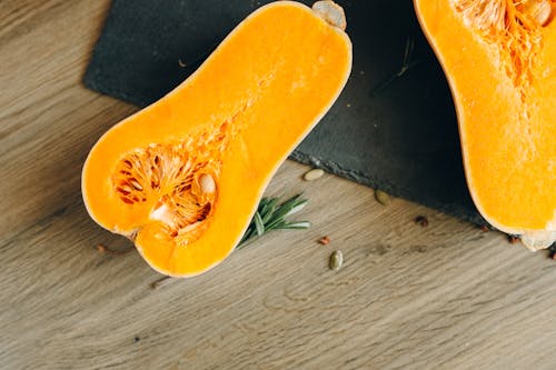 Orange Fruit on Black Wooden Table