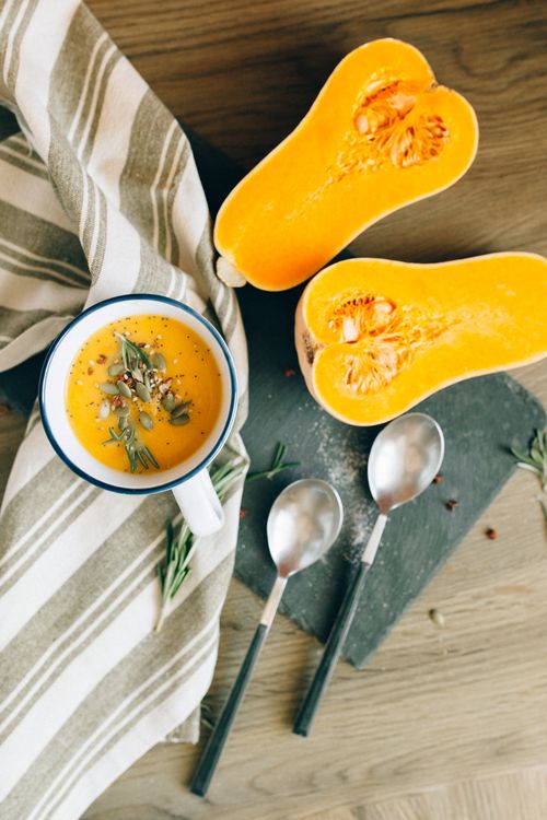 Free Top view of butternut squash soup and fresh squash, perfect for autumn meals. Stock Photo