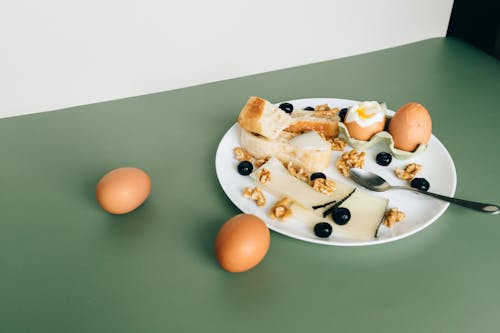 Free Egg and Walnuts on the Shite Plate Stock Photo