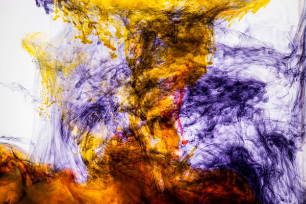 Coloured ink dispersing through water — photo by Engin Akyurt on Pexels