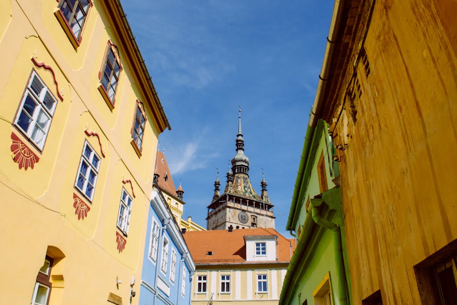 Colorful houses and Clock Tower of Sighisoara - Hidden gems Europe Colorful houses and Clock Tower of Sighisoara - Hidden gems Europe