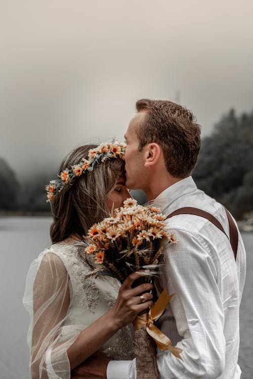 Loving couple embracing on riverside