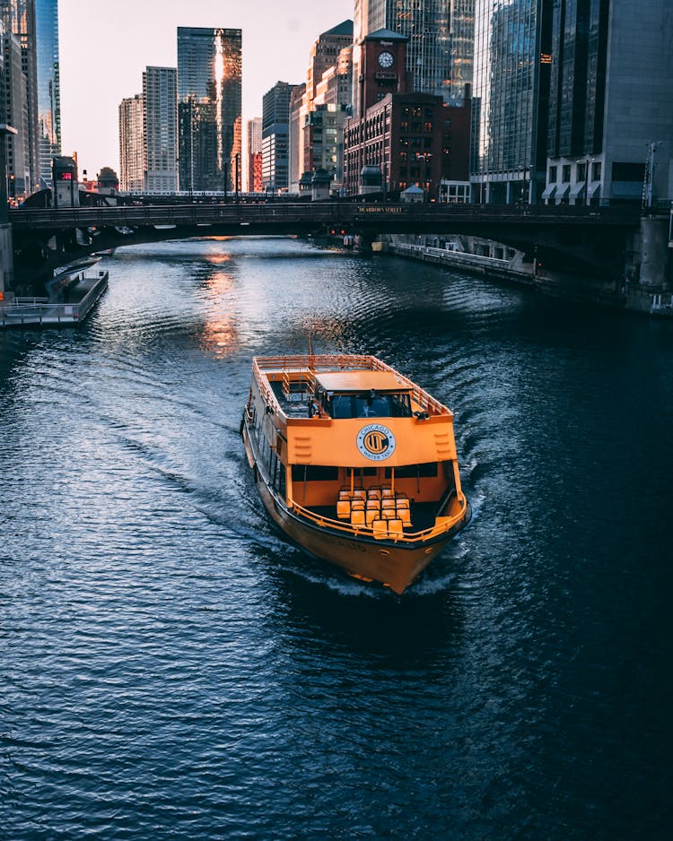 A Chicago Water Taxi Traveling On Chicago River 