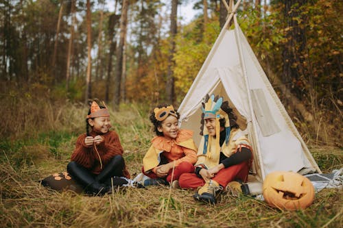 Children Wearing Costumes while Camping