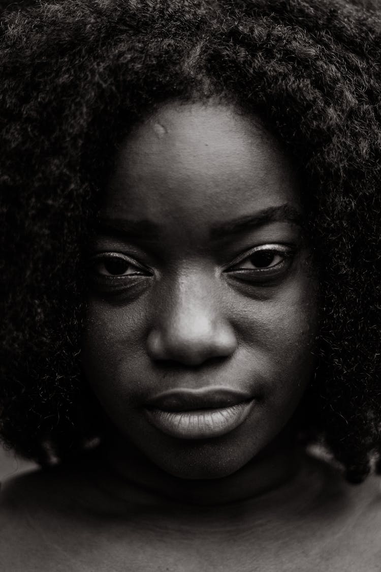 Serious Black Woman With Curly Hair