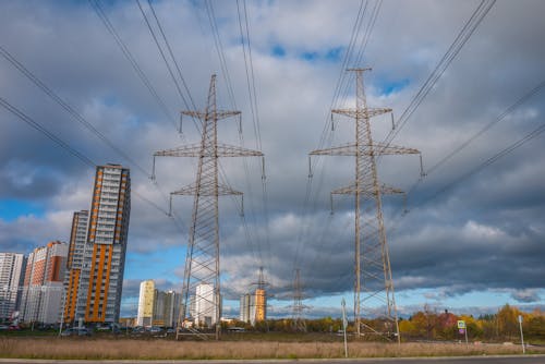 Transmission Towers Under the Cloudy Sky