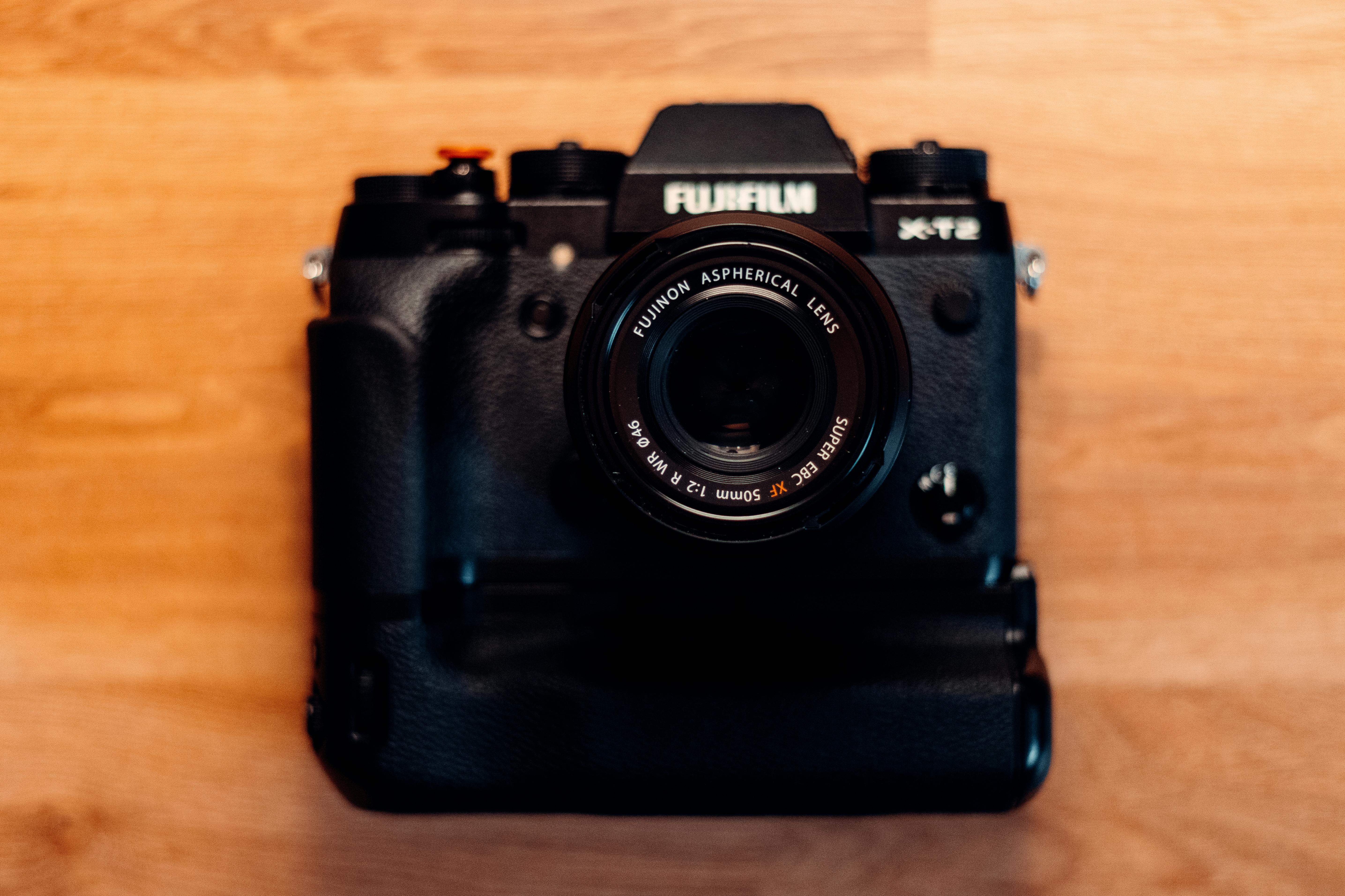 digital photo camera on table in room