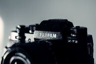 Inscription on front part of photo camera