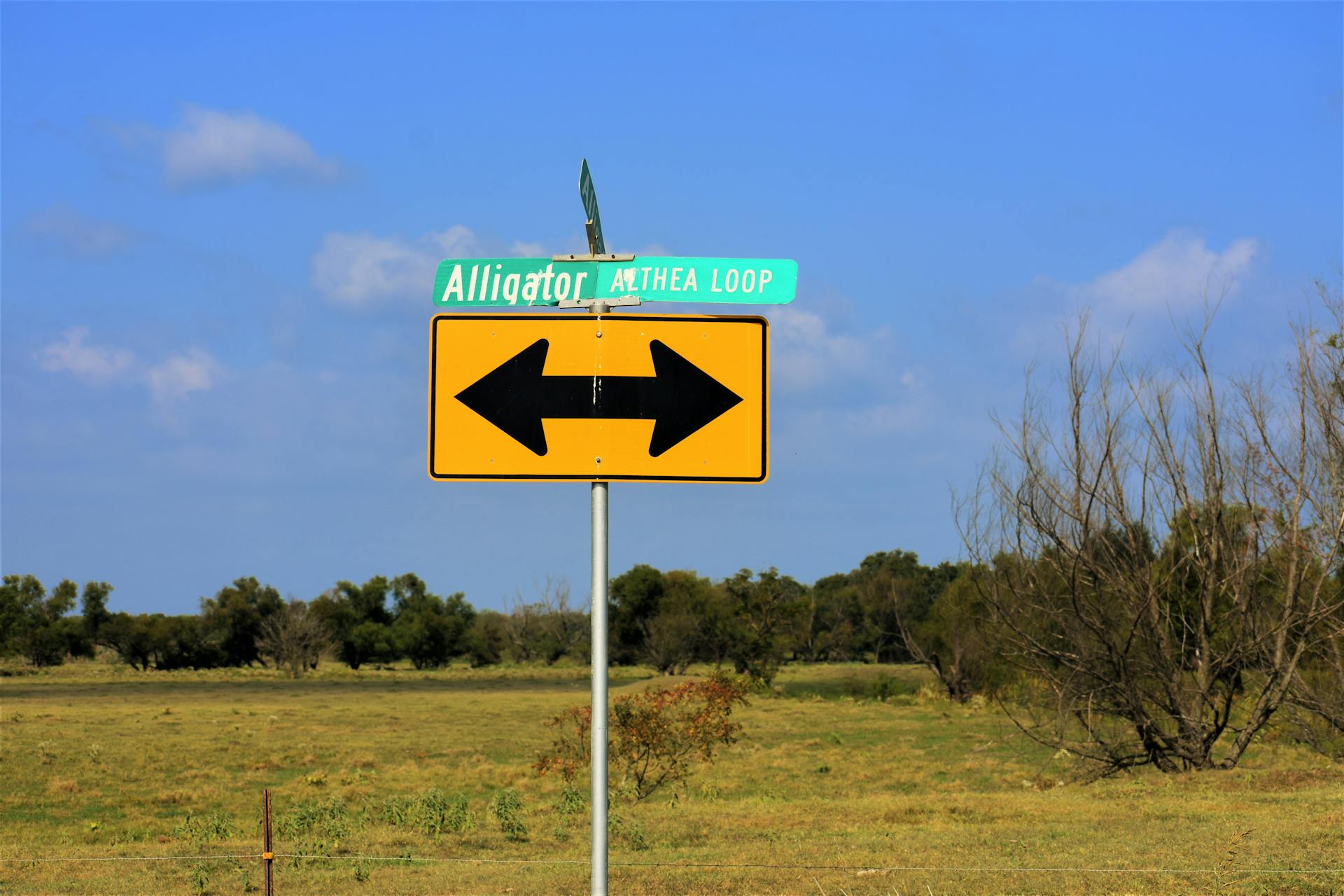 Black And Yellow Arrow Sign