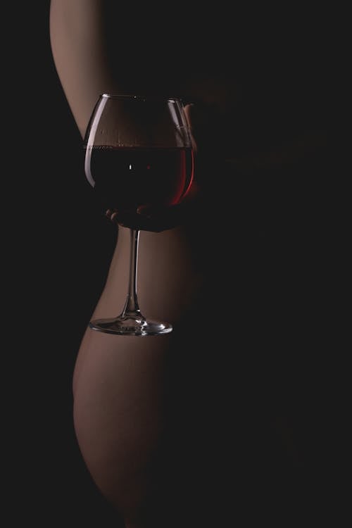 A Person Holding a Glass of Wine