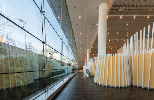 Explore a sleek and modern hallway with glass walls, located in Gwangju, South Korea.