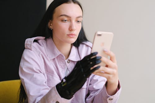 A Woman Holding a Smartphone