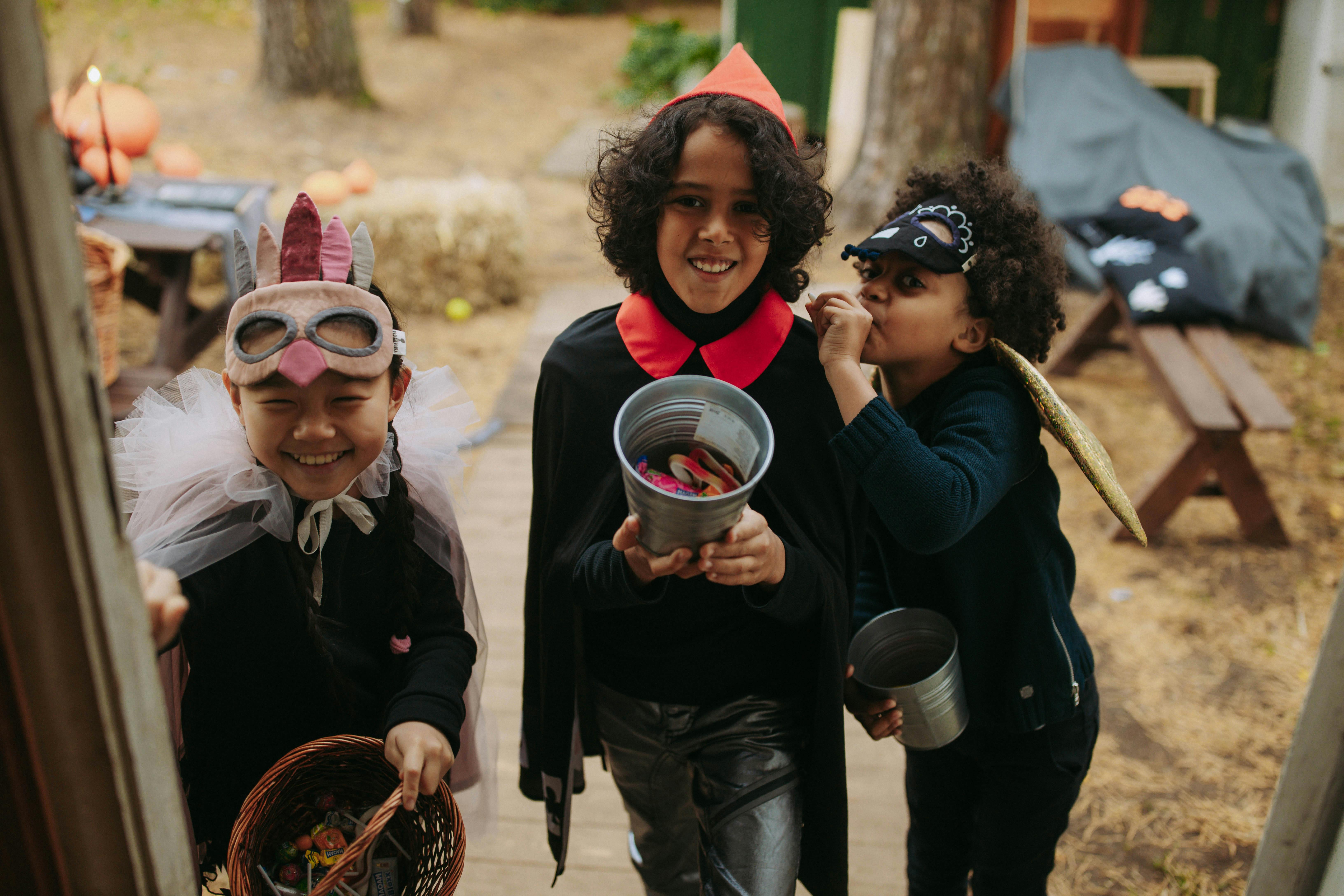 children doing trick of treat