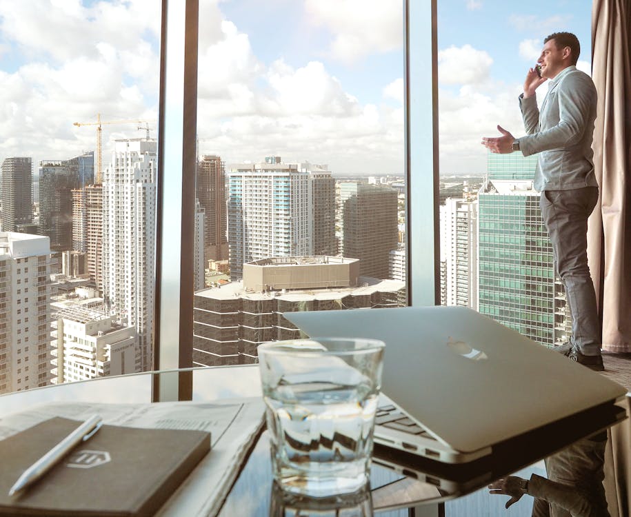 Free Man Taking to Mobile Phone Stock Photo