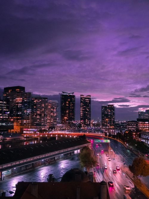 Free Discover the vibrant Melbourne skyline at twilight with dazzling city lights and skyscrapers. Stock Photo