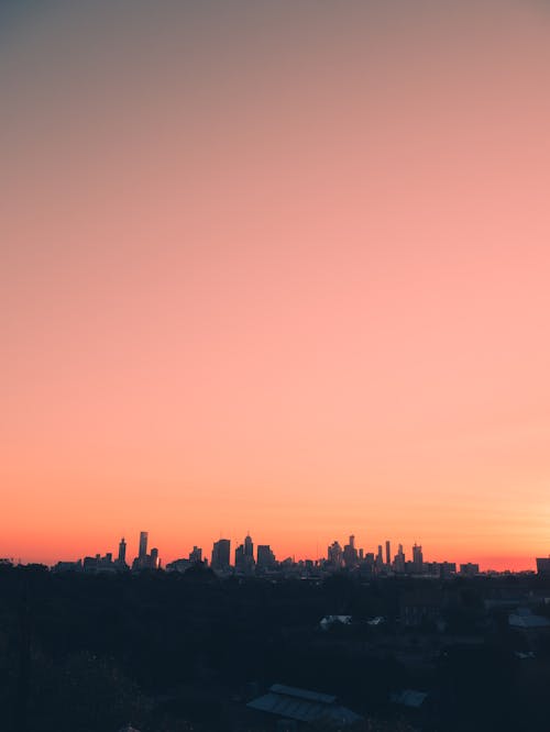 Silhouette of City Buildings during Sunset