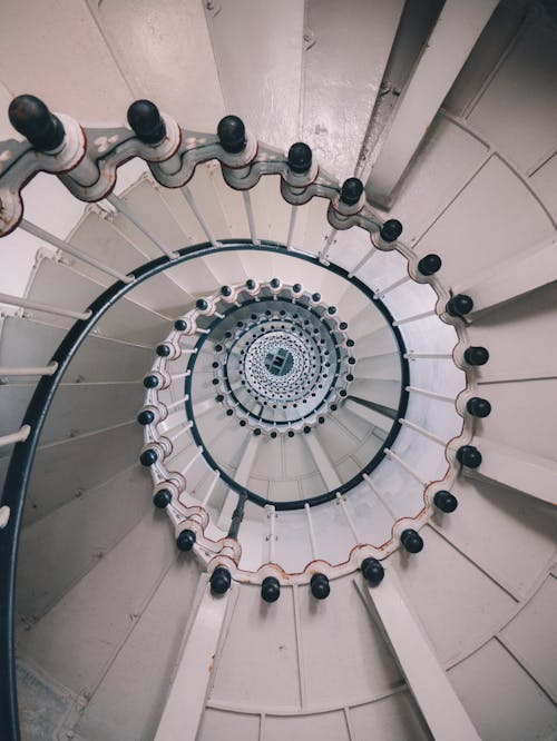 White Spiral Staircase With White Metal Railings