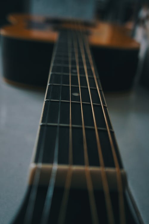 Gratis stockfoto met akoestische gitaar, detailopname, fretboard Stockfoto