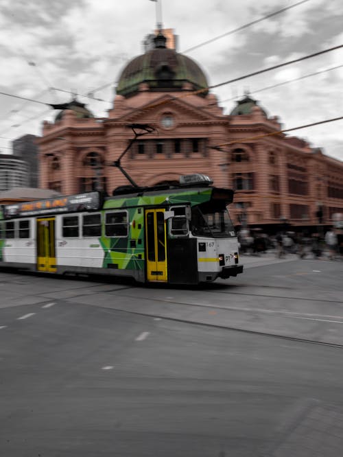Panning Shot of a Tram Moving in the City