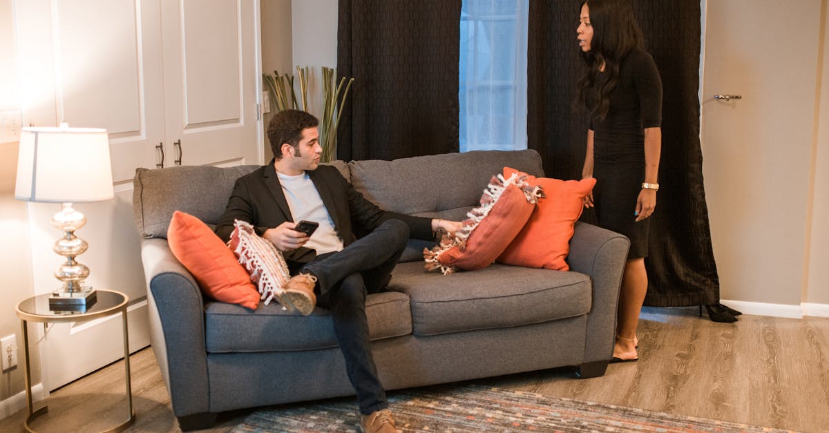 Couples Arguing In A Living Room Setting