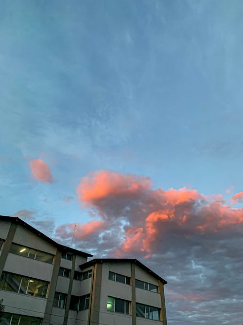 Cloudy sky over multistory apartment buildings